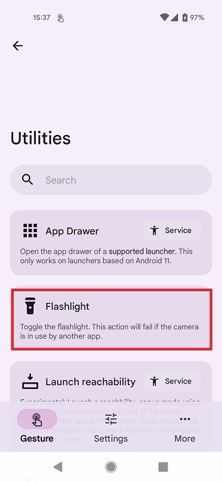 Selecting "Flashlight" option in Tap Tap app on Android.
