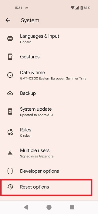 Tapping "Reset options" under "System" in Android Settings.