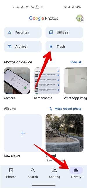 Tapping on "Library" option at the bottom in Google Photos app to bring up "Trash."