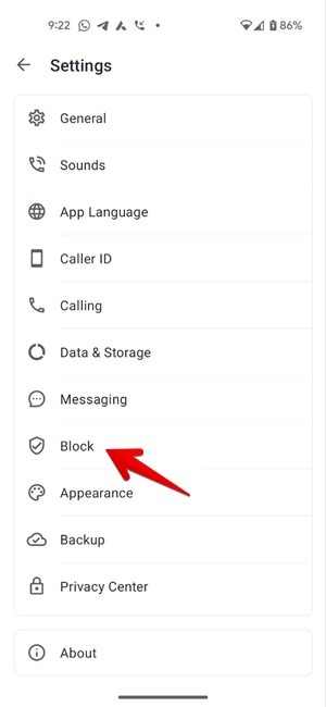 Clicking on "Block" option in Truecaller app. 