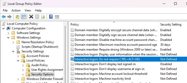 Clicking "Interactive logon: Do not require CTRL+ALT+DEL" policy in Group Policy Editor.