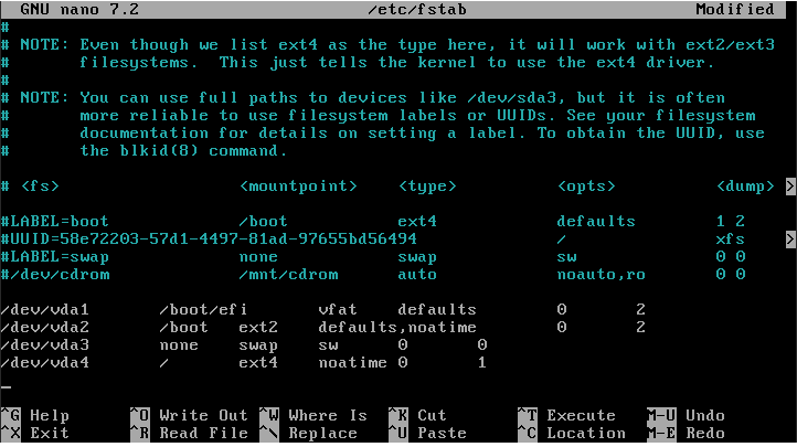 A terminal showing a simple fstab partition layout.